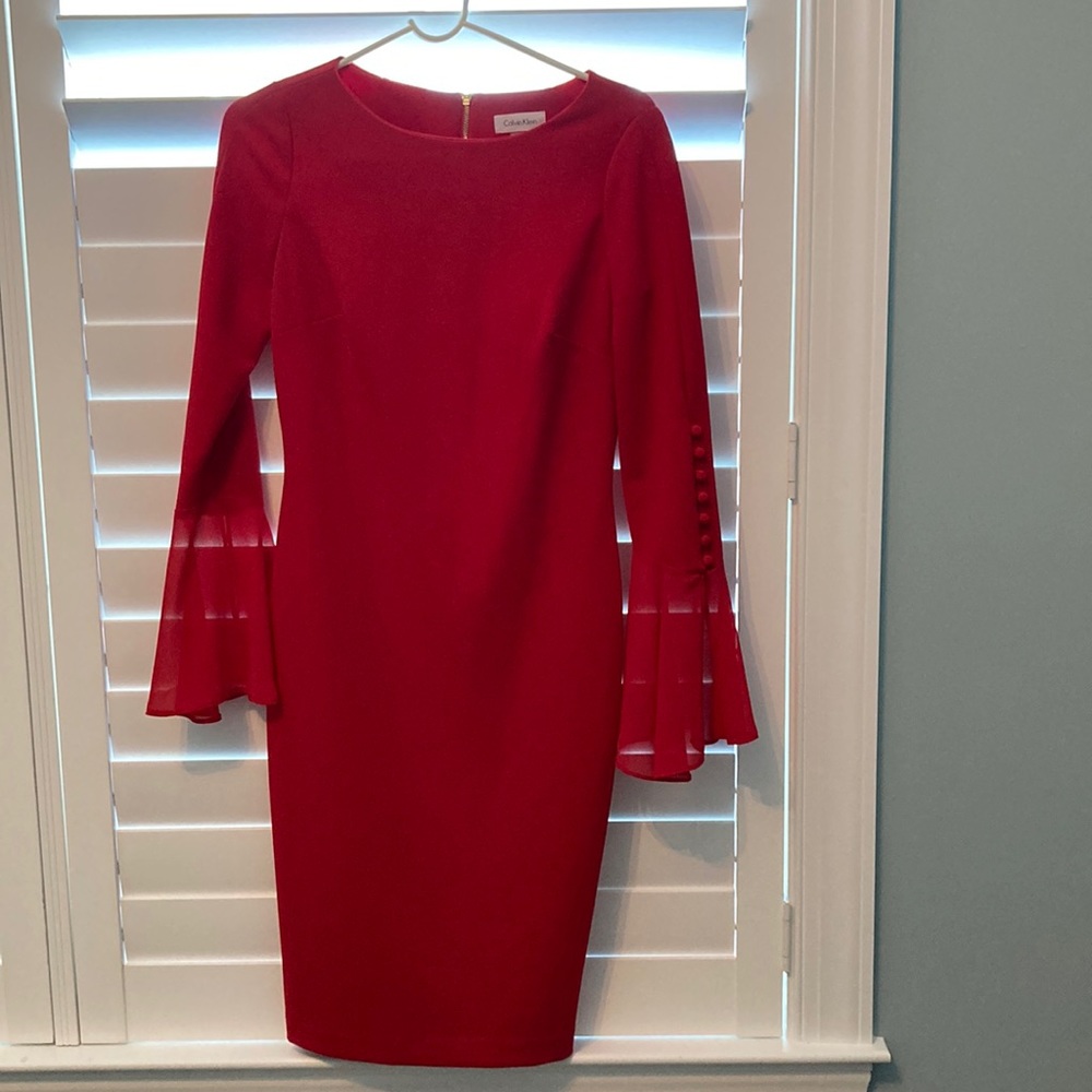 Calvin Klein size 4  bell 3/4 length sleeve worn once as a wedding guest.